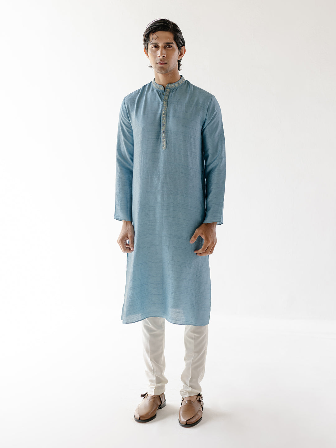 Solid Blue Cotton Silk Kurta Set at Kamakhyaa by RoohbyRidhimaa. This item is 100% pure cotton, Blue, Cotton Silk, Festive Wear, Kurta Pant Sets, Men Kurta Pant Sets, Menswear By RoohbyRidhimaa, Qala By RoohbyRidhimaa, Regular Fit, Solids, Viscose Raw Silk