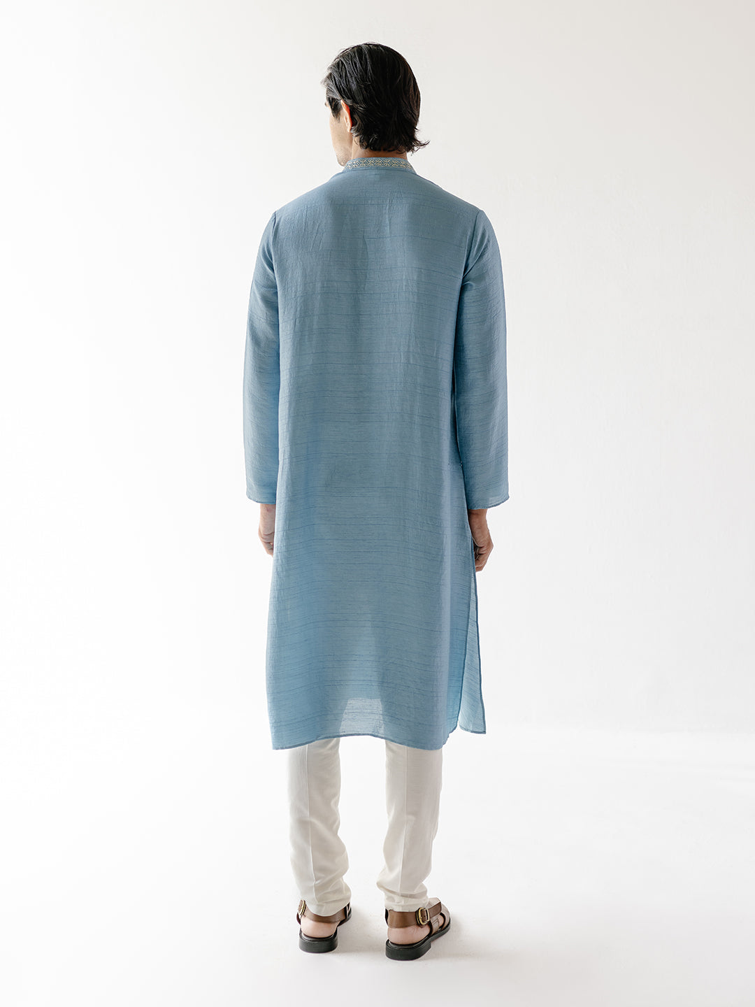 Solid Blue Cotton Silk Kurta Set at Kamakhyaa by RoohbyRidhimaa. This item is 100% pure cotton, Blue, Cotton Silk, Festive Wear, Kurta Pant Sets, Men Kurta Pant Sets, Menswear By RoohbyRidhimaa, Qala By RoohbyRidhimaa, Regular Fit, Solids, Viscose Raw Silk