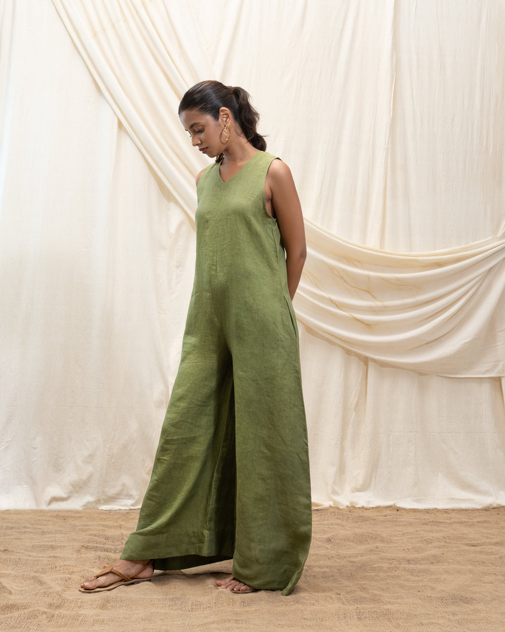 Solid Jumpsuit with back detailing at Kamakhyaa by Akashi Clothing. This item is 100% Linen, Regular Fit, Solid Selfmade, Solids, The Stamp Edit By Akashi Clothing, Under $200
