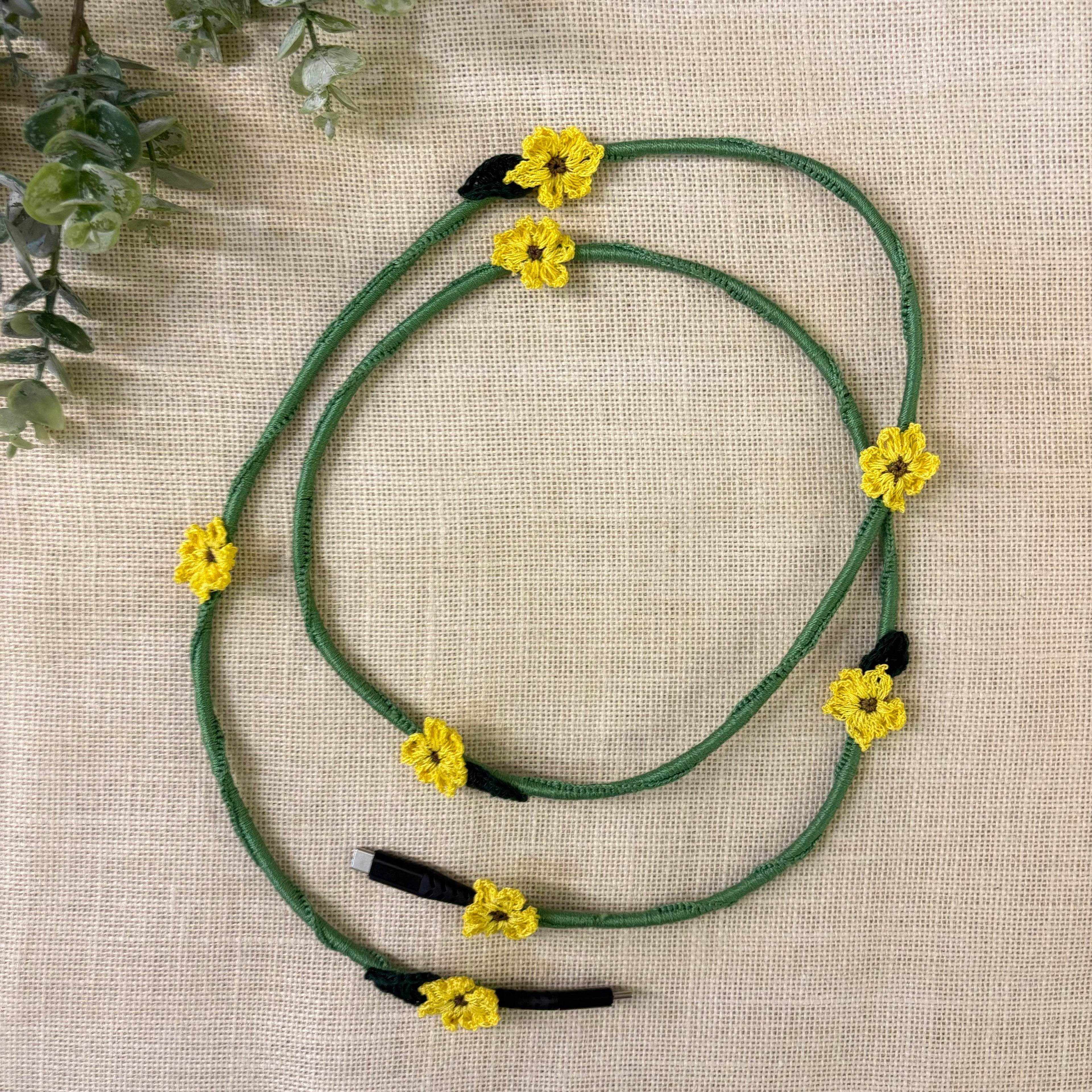 Sunflower Crochet Charging Cord C-C Cable at Kamakhyaa by Ikriit'm. This item is Bloom by Ikriit'm, Crochet, Relaxed Fit, Under $50