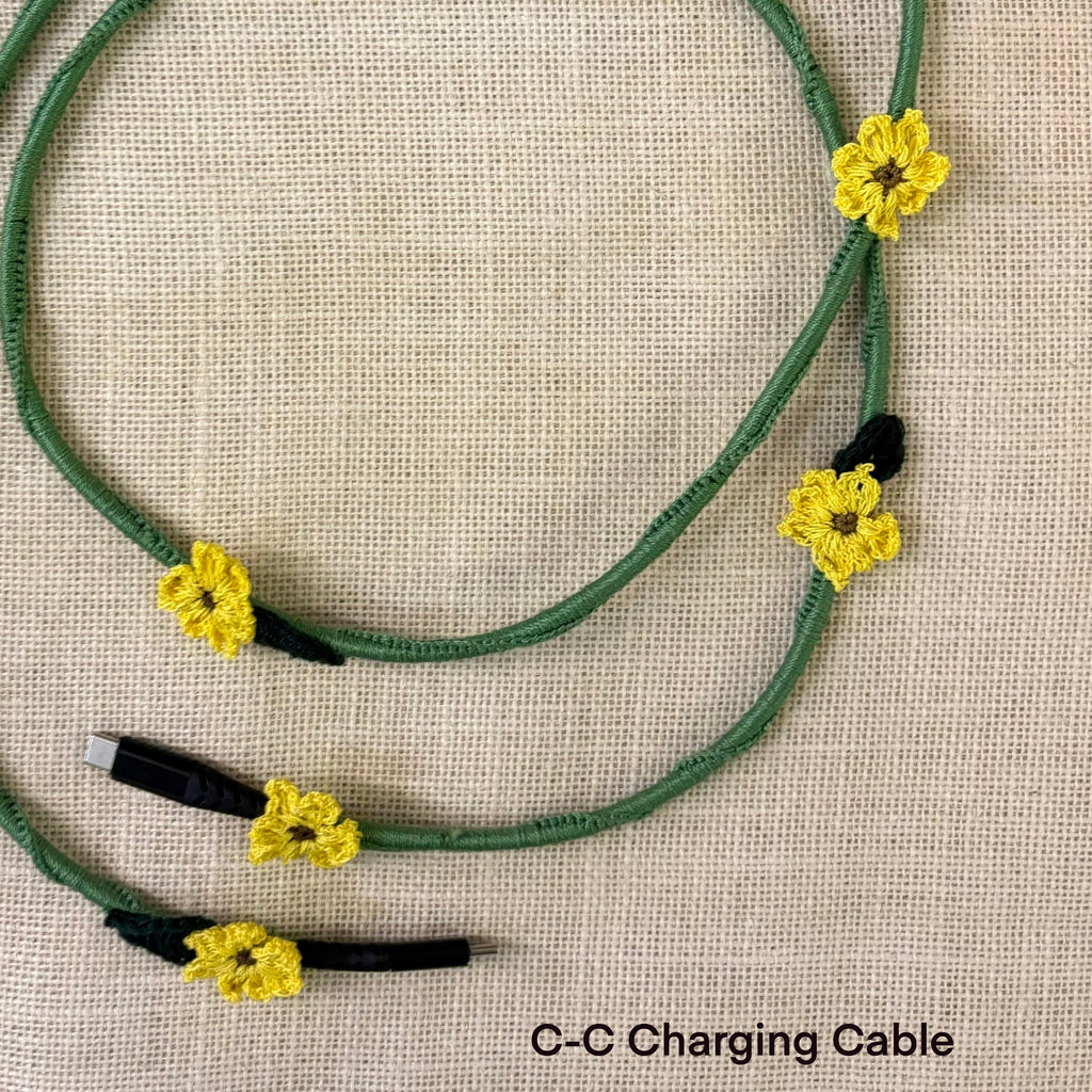 Sunflower Crochet Charging Cord C-C Cable at Kamakhyaa by Ikriit'm. This item is Bloom by Ikriit'm, Crochet, Relaxed Fit, Under $50
