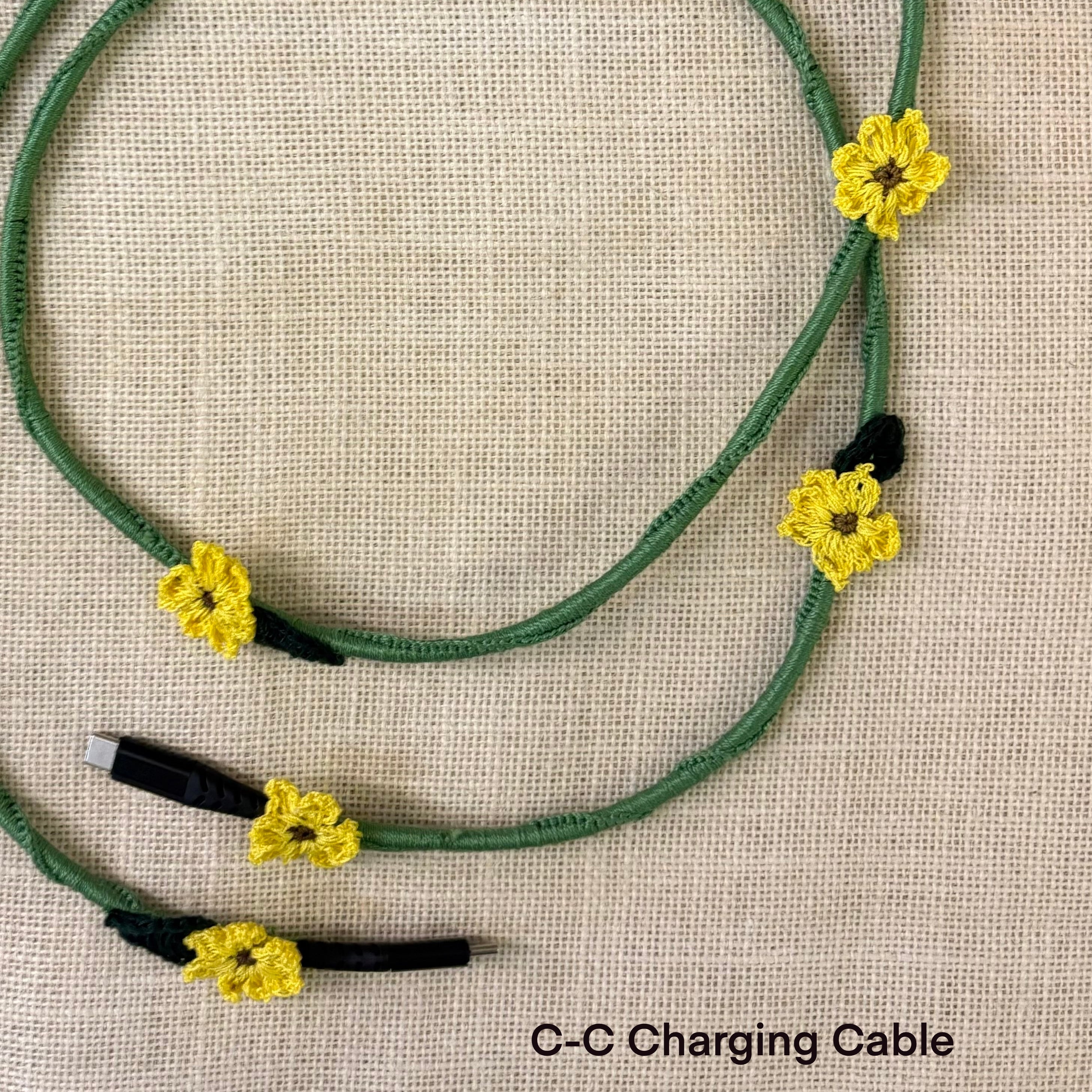 Sunflower Crochet Charging Cord C-C Cable at Kamakhyaa by Ikriit'm. This item is Bloom by Ikriit'm, Crochet, Relaxed Fit, Under $50