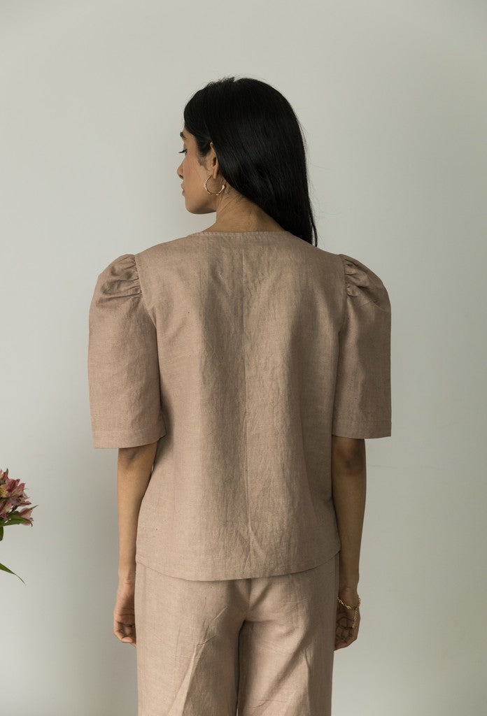 Sunset Rose Wrap Top at kamakhyaa.com by Anushé Pirani. This item is Beige, Casual Wear, Console Collection List, Cotton, Cotton Hemp, Handwoven, Hemp, Regular Fit, Shibumi by Anushe Pirani, Solids, Womenswear, Wrap Tops