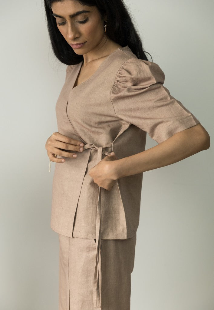 Sunset Rose Wrap Top at Kamakhyaa by Anushé Pirani. This item is Beige, Casual Wear, Cotton, Cotton Hemp, Handwoven, Hemp, Regular Fit, Shibumi by Anushe Pirani, Solids, Womenswear, Wrap Tops