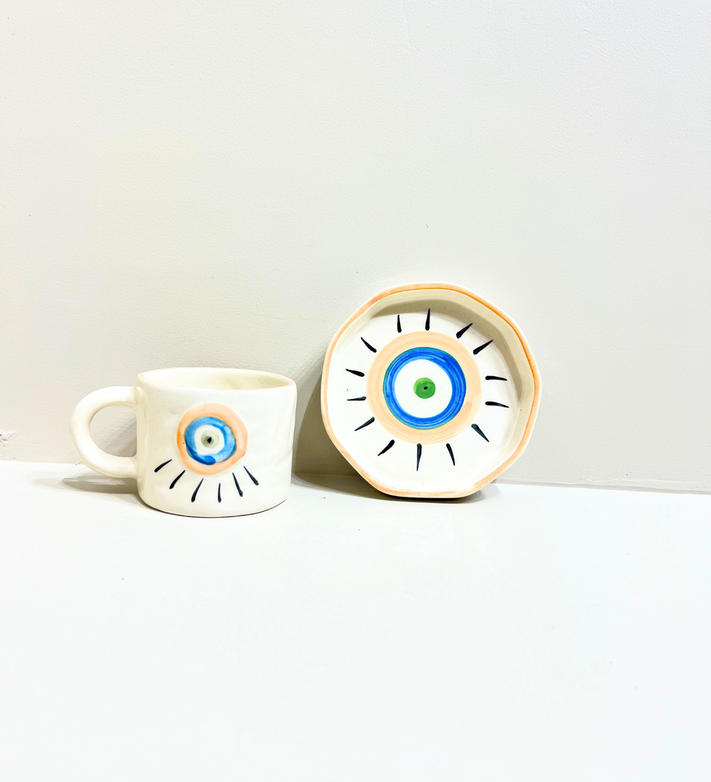 Sunstone Gaze – Evil Eye Ceramic Mug & Plate Set at Kamakhyaa by Aetherea World. This item is 