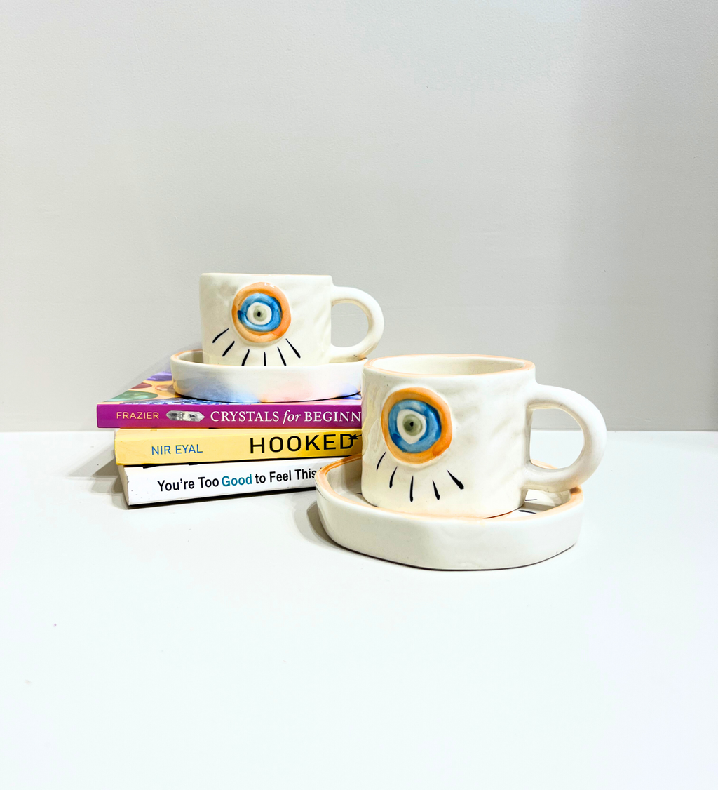 Sunstone Gaze – Evil Eye Ceramic Mug & Plate Set at Kamakhyaa by Aetherea World. This item is 