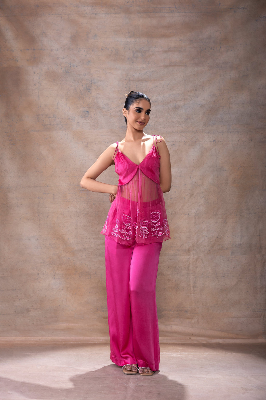 Tie-Up Peplum Tunic and Pant Set at Kamakhyaa by Akashi Clothing. This item is Co-ord Sets, Evening Wear, Festive Wear, Fusion Wear, Hand Embroidered, missing, Modal Satin, Organza, Party Wear, Party Wear Co-ord Sets, Pink, Relaxed Fit, Resort Wear, Wedding Wear, Womenswear, Zaira by Akashi Clothing