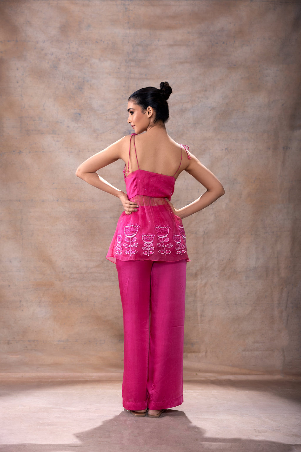 Tie-Up Peplum Tunic and Pant Set at Kamakhyaa by Akashi Clothing. This item is Co-ord Sets, Evening Wear, Festive Wear, Fusion Wear, Hand Embroidered, missing, Modal Satin, Organza, Party Wear, Party Wear Co-ord Sets, Pink, Relaxed Fit, Resort Wear, Wedding Wear, Womenswear, Zaira by Akashi Clothing