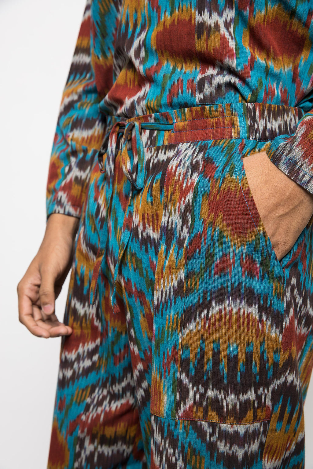 Urban Jammies at kamakhyaa.com by Anushé Pirani. This item is 100% Cotton, Beach Wear, Casual Wear, Console Collection List, Cotton, Fresh Ink by Anushe Pirani, Handwoven cotton, Ikat Prints, Menswear, Regular Fit, Turquoise, Vacation Wear