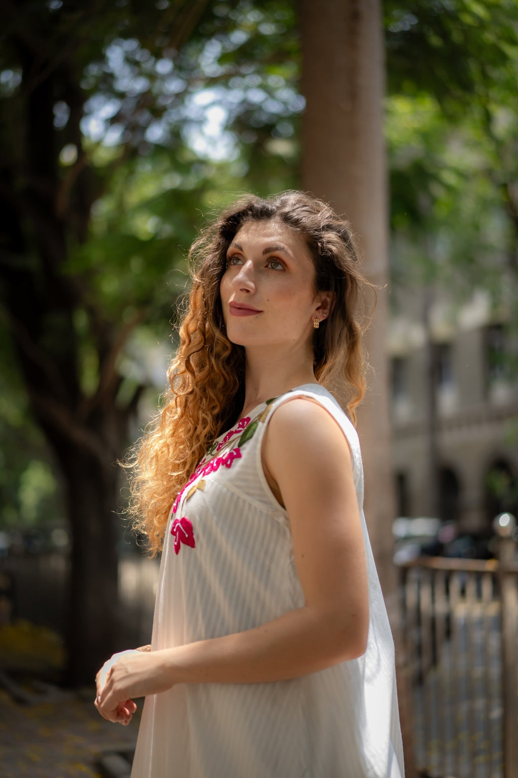 White A-line Dress with Floral Hand-Embroidery at Kamakhyaa by Krushnachuda. This item is Chilika by Krushnachuda, Embroidered, Handloom Cotton, Loose Fit, Natural Dye, Organic, Outerwear, Under $200, White, Womenswear