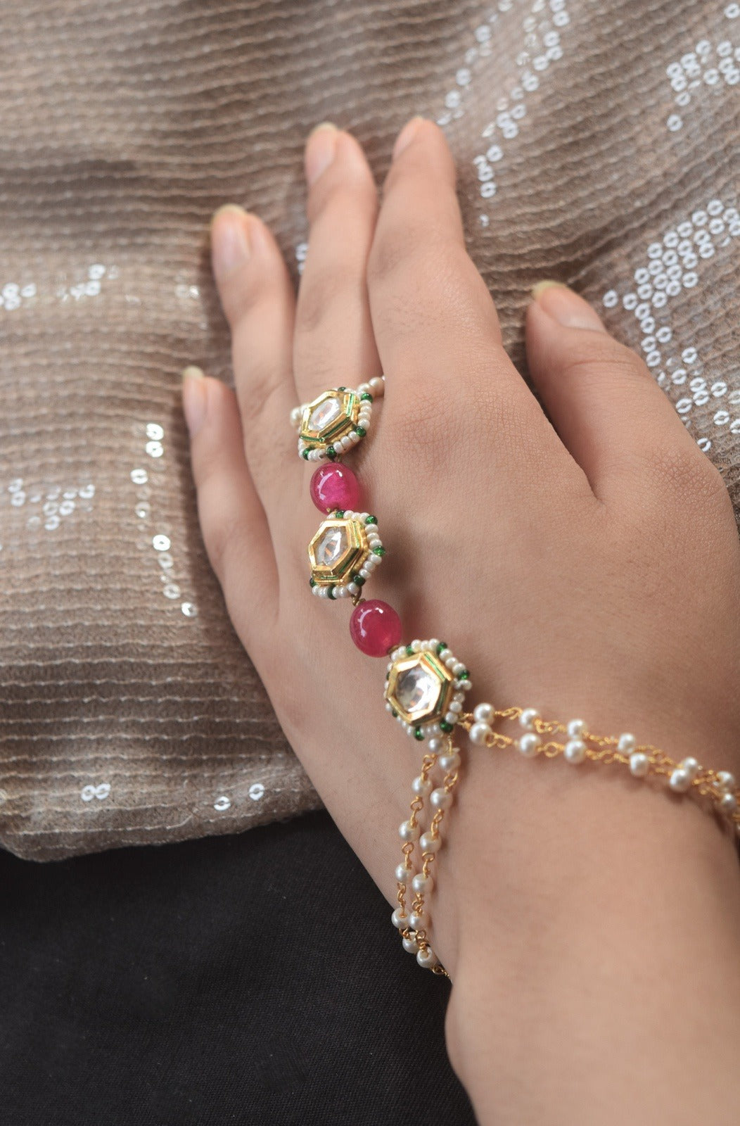 White Bracelets Falak Hand Harness at Kamakhyaa by House Of Heer. This item is Add Ons, Alloy Metal, Bracelets, Festive Jewellery, Festive Wear, Free Size, Gemstone, jewelry, July Sale, July Sale 2023, Less than $50, Natural, Pearl, Polkis, Products less than $25, Ring Bracelets, Textured