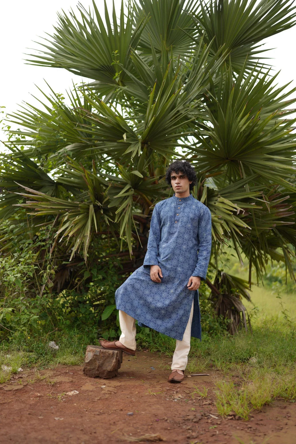 White Butta Printed Kurta for Men at Kamakhyaa by Hasttvam. This item is Cotton, Festive Wear, Floral, Handmade by Artisans, Indigo, Natural dyes, Relaxed Fit, Respondible production and Vegan
