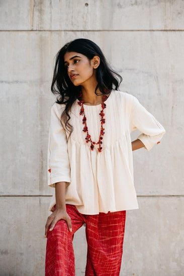 White Casual Wear Tunic Top at Kamakhyaa by Araayeh. This item is Artisan Made, Casual Wear, Handwoven Cotton, Relaxed Fit, Solids, Tunic Tops, White