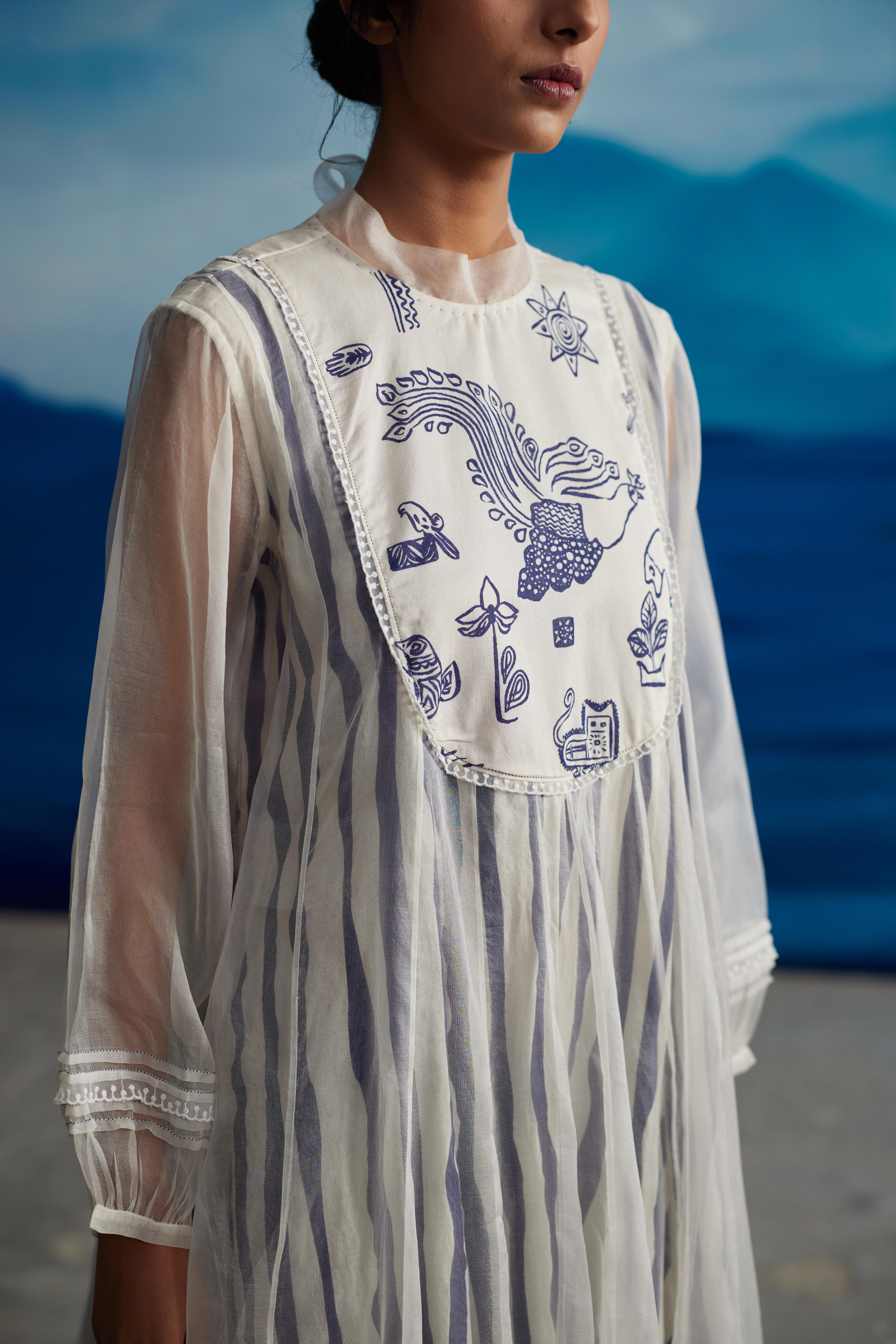 White Chanderi Midi Dress With Puffed Sleeves at Kamakhyaa by Ahmev. This item is Casual Wear, Chanderi, Indigo Eden by Ahmev, Korean Chic, Lace, Midi Dresses, Natural, Regular Fit, Stripes, White, Womenswear