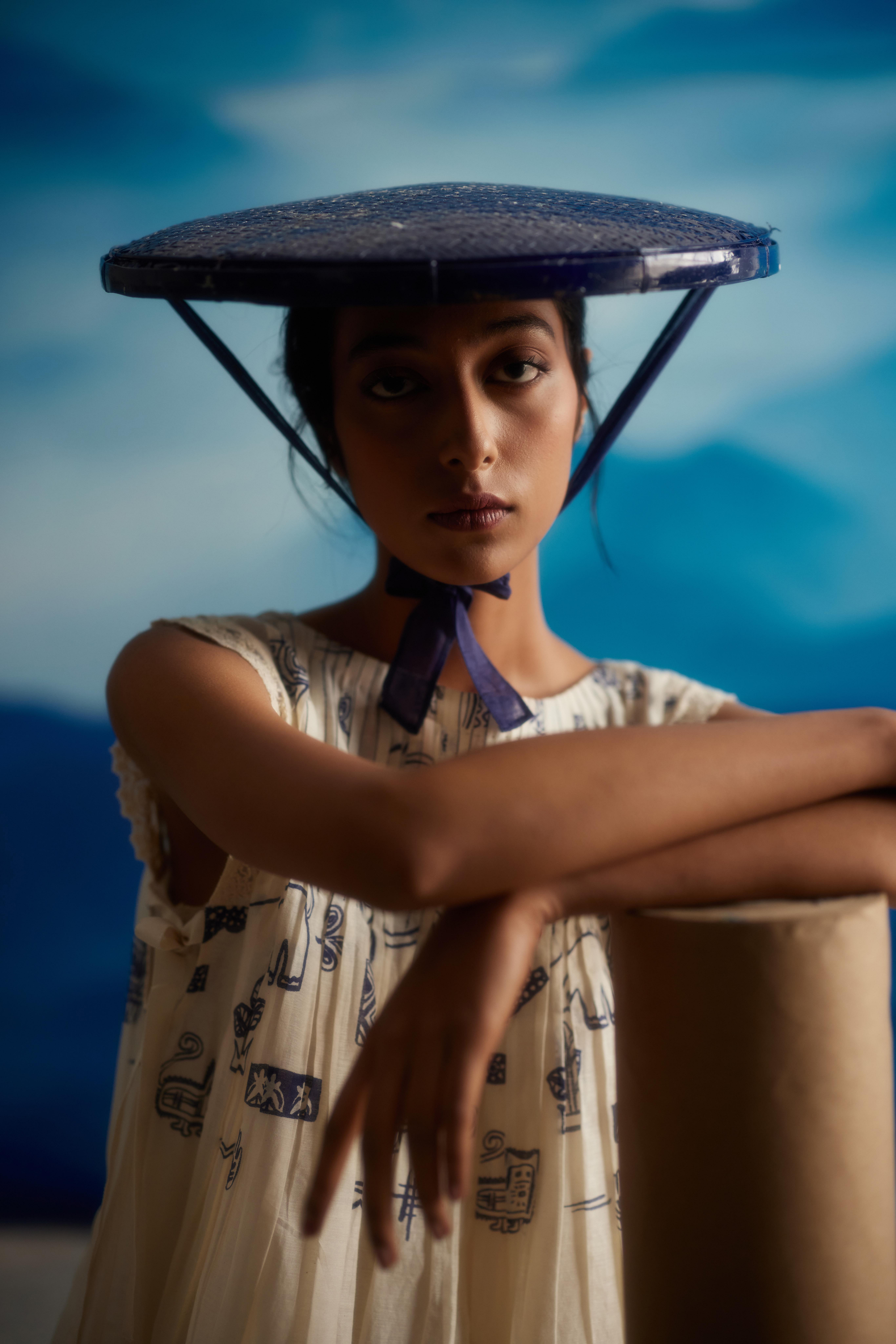 White Chanderi Pleated Midi Dress With Bow Tie-Up at Kamakhyaa by Ahmev. This item is Casual Wear, Chanderi, Indigo Eden by Ahmev, Korean Chic, Lace, Midi Dresses, Natural, Prints, Regular Fit, White, Womenswear