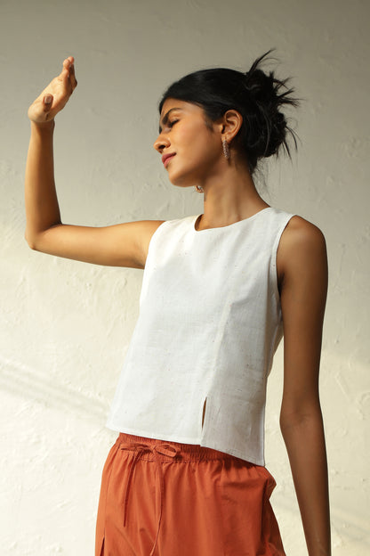 White Cotton Front Slit Top With Orange Palazzo Co-Ord Set at Kamakhyaa by Canoopi. This item is Canoopi, Casual Wear, Complete Sets, Khadi, Natural, Orange, Poplin, Regular Fit, Solids, Vacation Co-ords, White, Womenswear