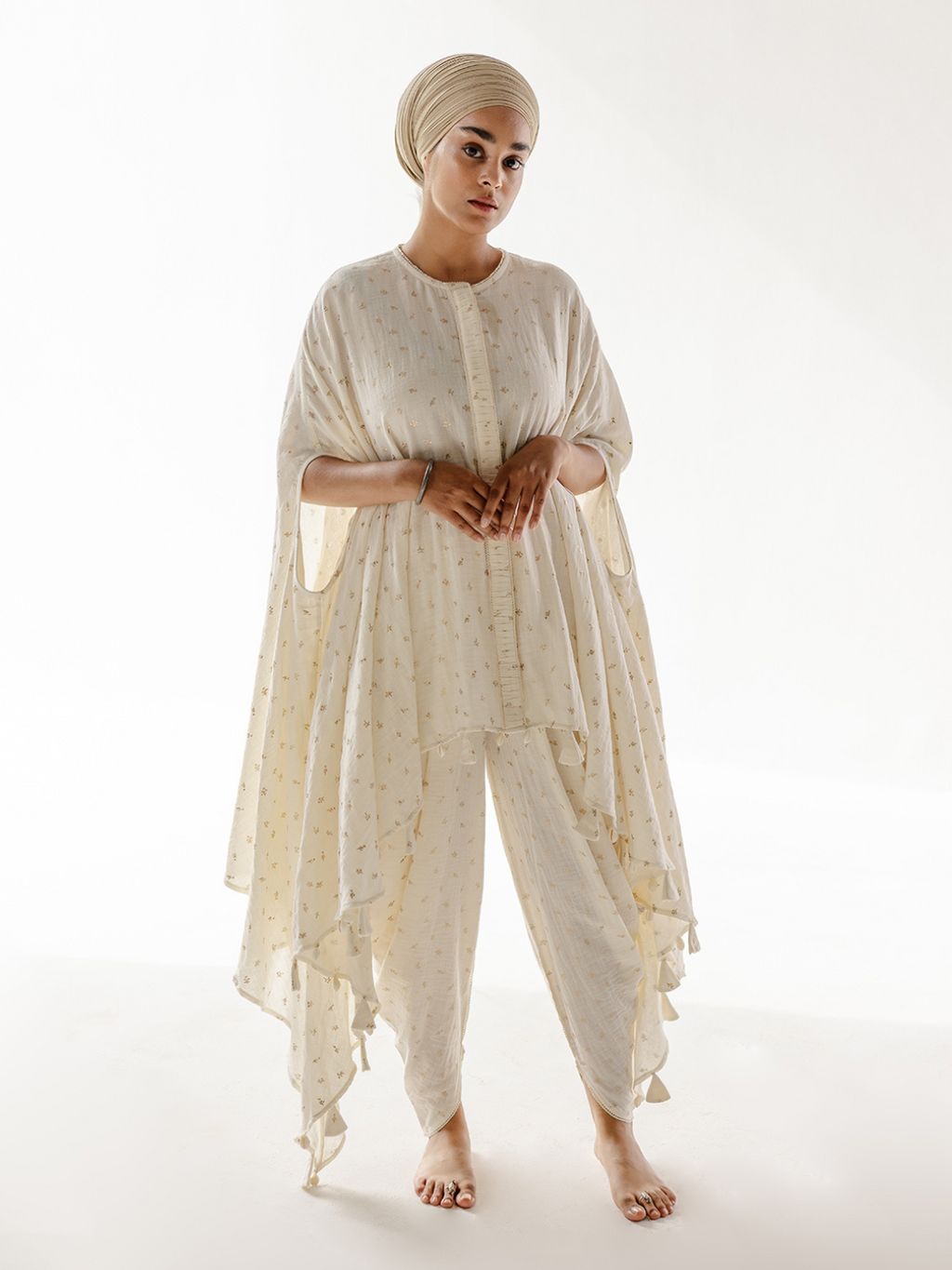 White Cotton Muslin Kurta with Dhoti Pant Set at Kamakhyaa by RoohbyRidhimaa. This item is Casual Wear, Cotton, Cotton Muslin, Kurta Sets, Relaxed Fit, Tassel Work, Toxin free, White