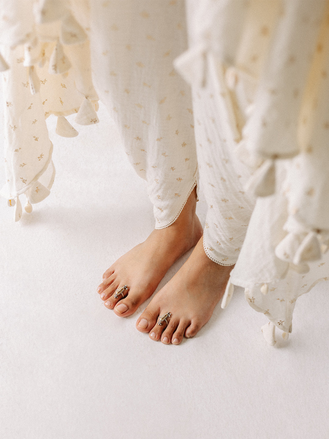 White Cotton Muslin Kurta with Dhoti Pant Set at Kamakhyaa by RoohbyRidhimaa. This item is Casual Wear, Cotton, Cotton Muslin, Kurta Sets, Relaxed Fit, Tassel Work, Toxin free, White