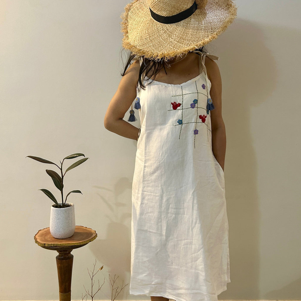White Flora Linen Dress at Kamakhyaa by Ikriit'm. This item is Bloom by Ikriit'm, Casual Wear, Crochet, Crochet Apparel, Linen, Relaxed Fit, Under $100, White, Womenswear