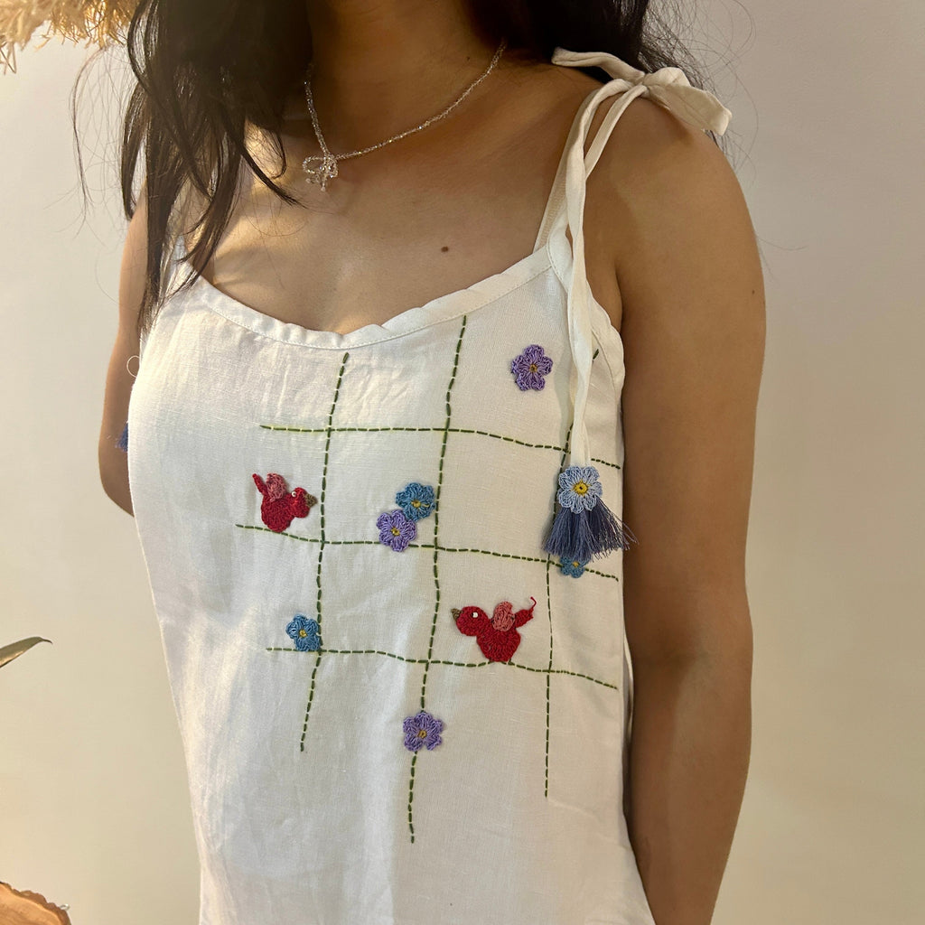 White Flora Linen Dress at Kamakhyaa by Ikriit'm. This item is Bloom by Ikriit'm, Casual Wear, Crochet, Crochet Apparel, Linen, Relaxed Fit, Under $100, White, Womenswear