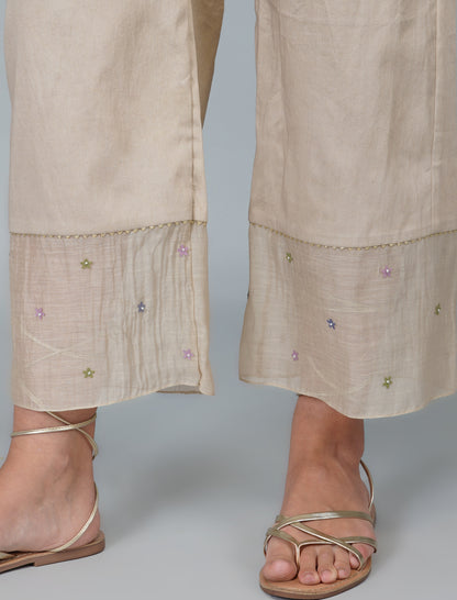 White Hand Embroidered Applique Kurta Pant Set at Kamakhyaa by Devyani Mehrotra. This item is Chanderi Silk, Co-ord Sets, Cotton, Embroidered, Festive Wear, Kurta Pant Sets, Natural, Partywear Co-ords, Patchwork, Pre Spring 2023, Regular Fit, White, Womenswear