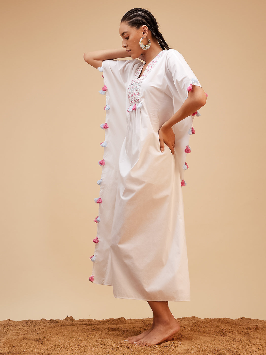 White Hand Embroidered Tassled Kaftan at Kamakhyaa by Bohobi. This item is 100% Cotton, Evening Wear, Hand Embroidered, Kaftans, Regular Fit, Toxin free, White