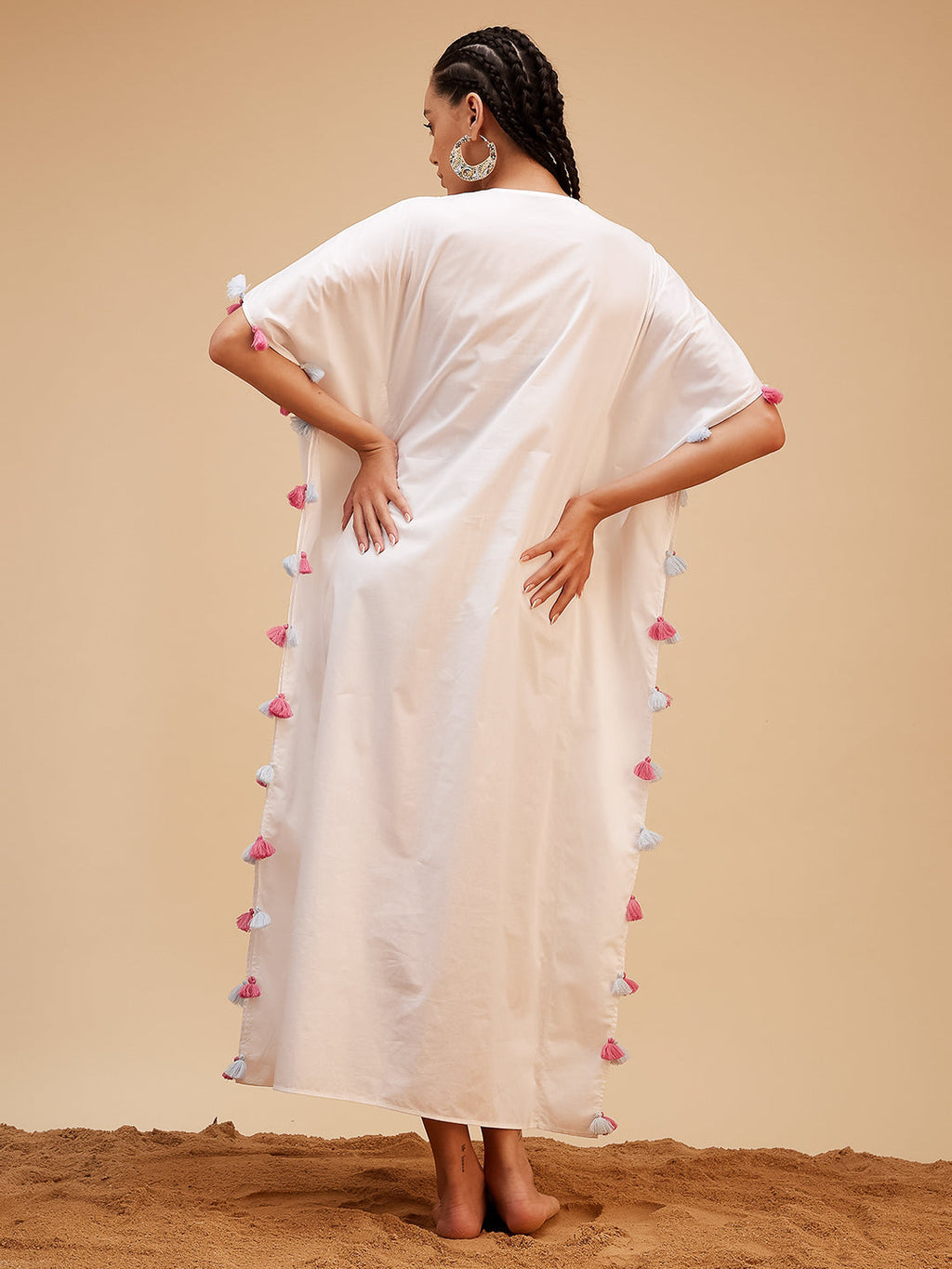 White Hand Embroidered Tassled Kaftan at Kamakhyaa by Bohobi. This item is 100% Cotton, Evening Wear, Hand Embroidered, Kaftans, Regular Fit, Toxin free, White