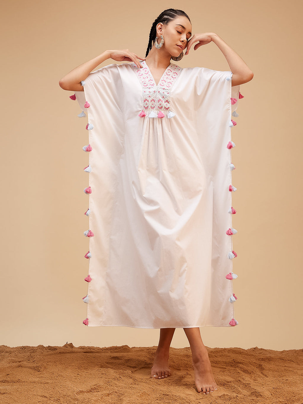 White Hand Embroidered Tassled Kaftan at Kamakhyaa by Bohobi. This item is 100% Cotton, Evening Wear, Hand Embroidered, Kaftans, Regular Fit, Toxin free, White