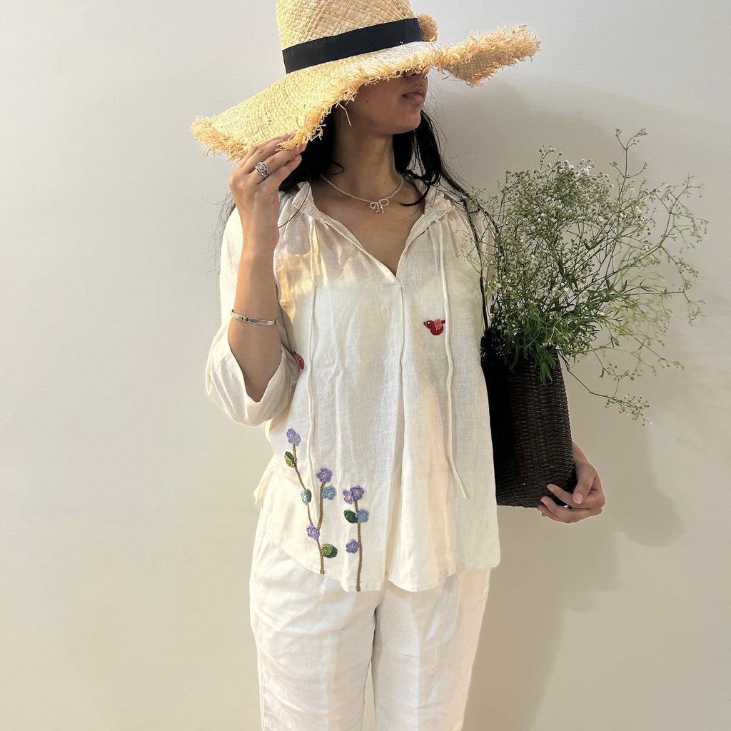 White Serene Stich Linen Top at Kamakhyaa by Ikriit'm. This item is Bloom by Ikriit'm, Casual Wear, Crochet, Crochet Apparel, Linen, Relaxed Fit, Under $100, White, Womenswear