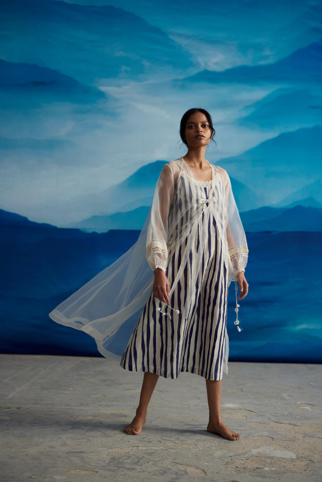 White Striped Tie-Up Midi Dress at Kamakhyaa by Ahmev. This item is Casual Wear, Indigo Eden by Ahmev, Korean Chic, Lace, Midi Dresses, Natural, Organza, Regular Fit, Stripes, White, Womenswear
