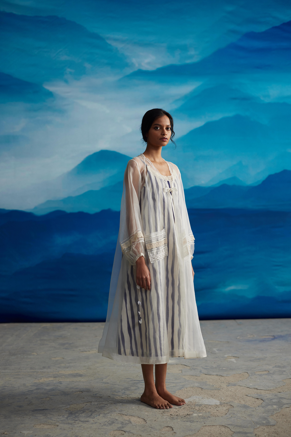 White Striped Tie-Up Midi Dress at Kamakhyaa by Ahmev. This item is Casual Wear, Indigo Eden by Ahmev, Korean Chic, Lace, Midi Dresses, Natural, Organza, Regular Fit, Stripes, White, Womenswear