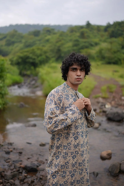 White With Blue Floral Kurta for Men at Kamakhyaa by Hasttvam. This item is Festive Wear, Floral, Handmade by Artisans, Natural dyes, Relaxed Fit, Respondible production and Vegan, White