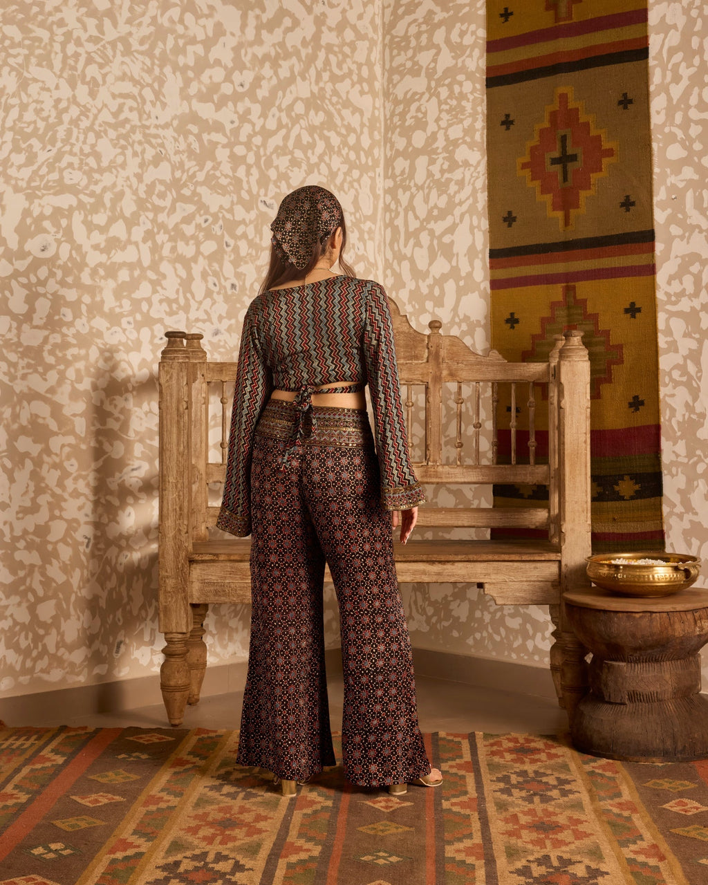 Wrap top with flared pant set at Kamakhyaa by Akashi Clothing. This item is Ajrakh by Akashi Clothing, Under $200