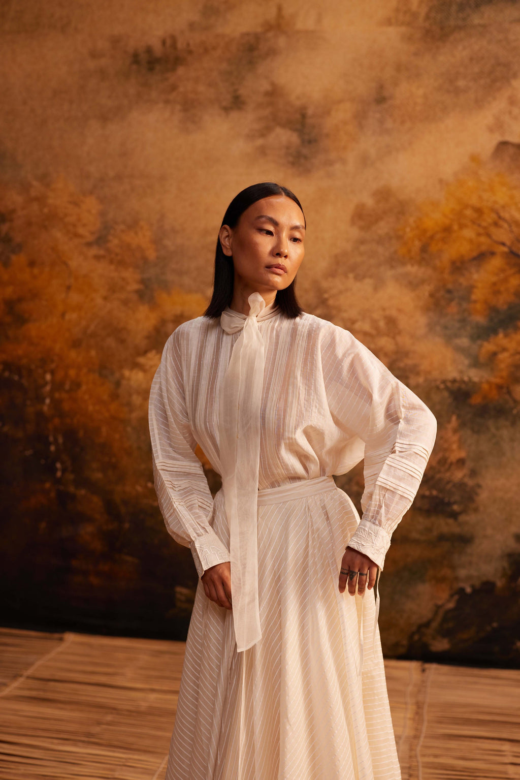 Yama-Ori Dolman Shirt with Ribbon at Kamakhyaa by Ahmev. This item is Cotton Silk, Ivory, Maximum Minimum by Ahmev, missing, Relaxed Fit, Shirt, Striped, Top, Womenswear