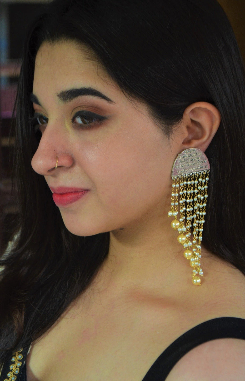 Yellow Jhumkas Mantra Waterfall Pearl at Kamakhyaa by House Of Heer. This item is Alloy Metal, Festive Jewellery, Festive Wear, Free Size, jewelry, July Sale, July Sale 2023, Less than $50, Long Earrings, Natural, Pearl, Solids, Textured, Yellow