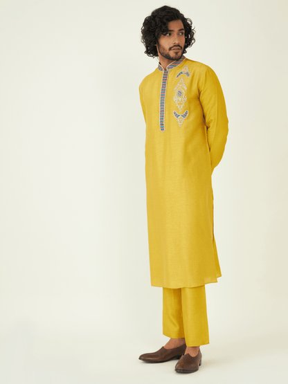 Yellow Regular Fit Kurta Set at Kamakhyaa by RoohbyRidhimaa. This item is Festive Wear, Kurta Pant Sets, Men Kurta Pant Sets, Menswear By RoohbyRidhimaa, Qala By RoohbyRidhimaa, Regular Fit, Solids, Viscose Raw Silk, Yellow