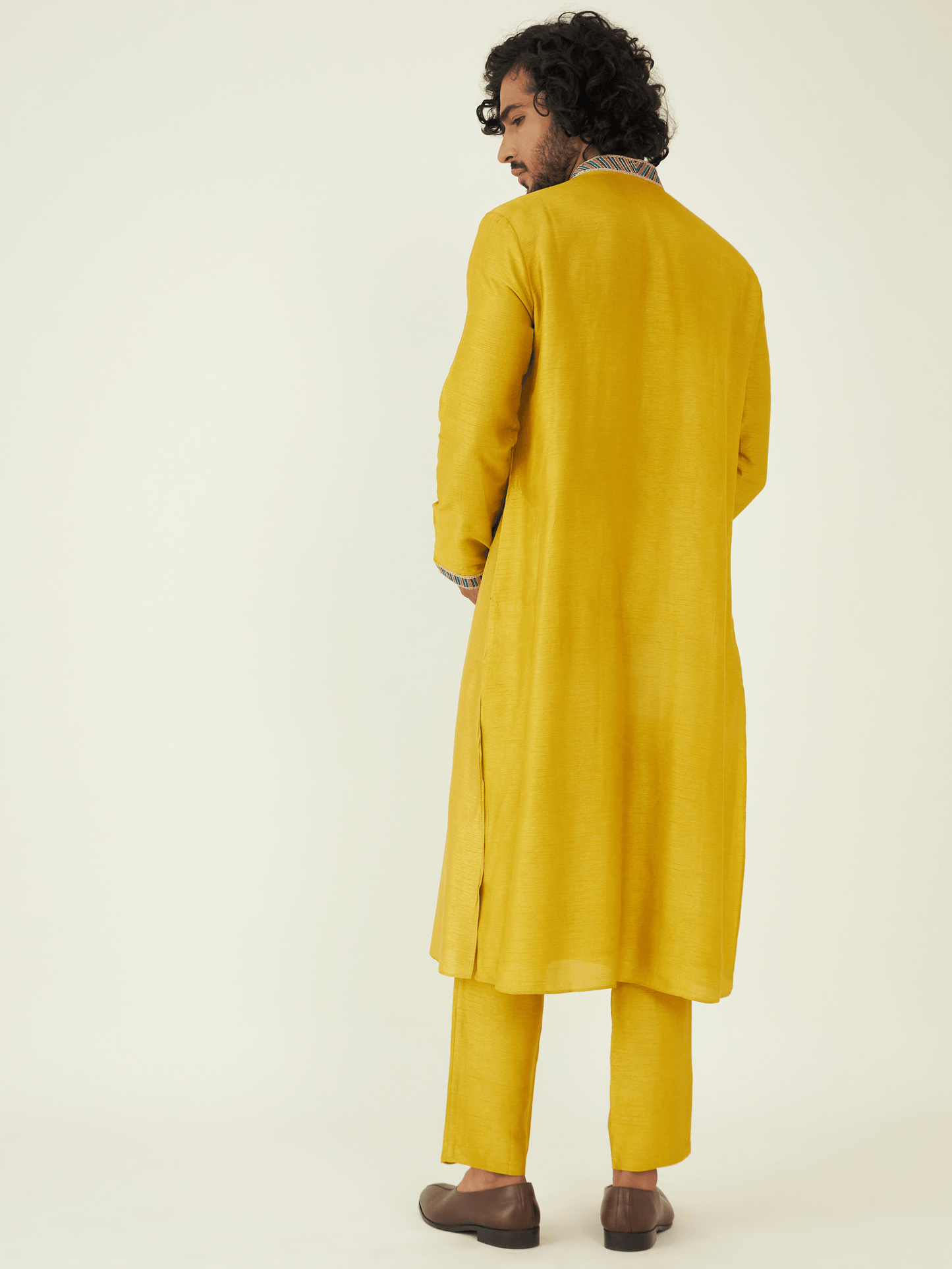 Yellow Regular Fit Kurta Set at Kamakhyaa by RoohbyRidhimaa. This item is Festive Wear, Kurta Pant Sets, Men Kurta Pant Sets, Menswear By RoohbyRidhimaa, Qala By RoohbyRidhimaa, Regular Fit, Solids, Viscose Raw Silk, Yellow