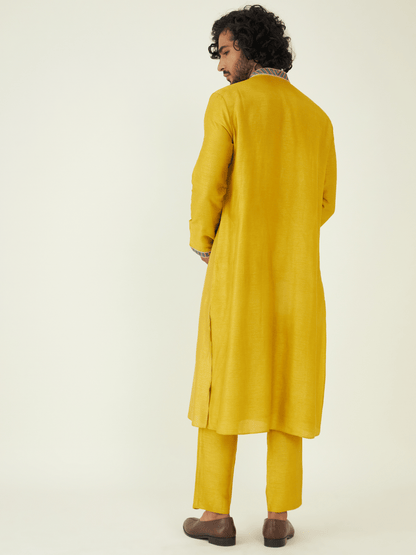 Yellow Regular Fit Kurta Set at Kamakhyaa by RoohbyRidhimaa. This item is Festive Wear, Kurta Pant Sets, Men Kurta Pant Sets, Menswear By RoohbyRidhimaa, Qala By RoohbyRidhimaa, Regular Fit, Solids, Viscose Raw Silk, Yellow