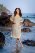 Yellow Striped Frilled Sleeve Dress at Kamakhyaa by Krushnachuda. This item is Handloom Cotton, Midi Dresses, Natural Dye, Organic, Relaxed Fit, Resort Wear, Stripes, Yellow