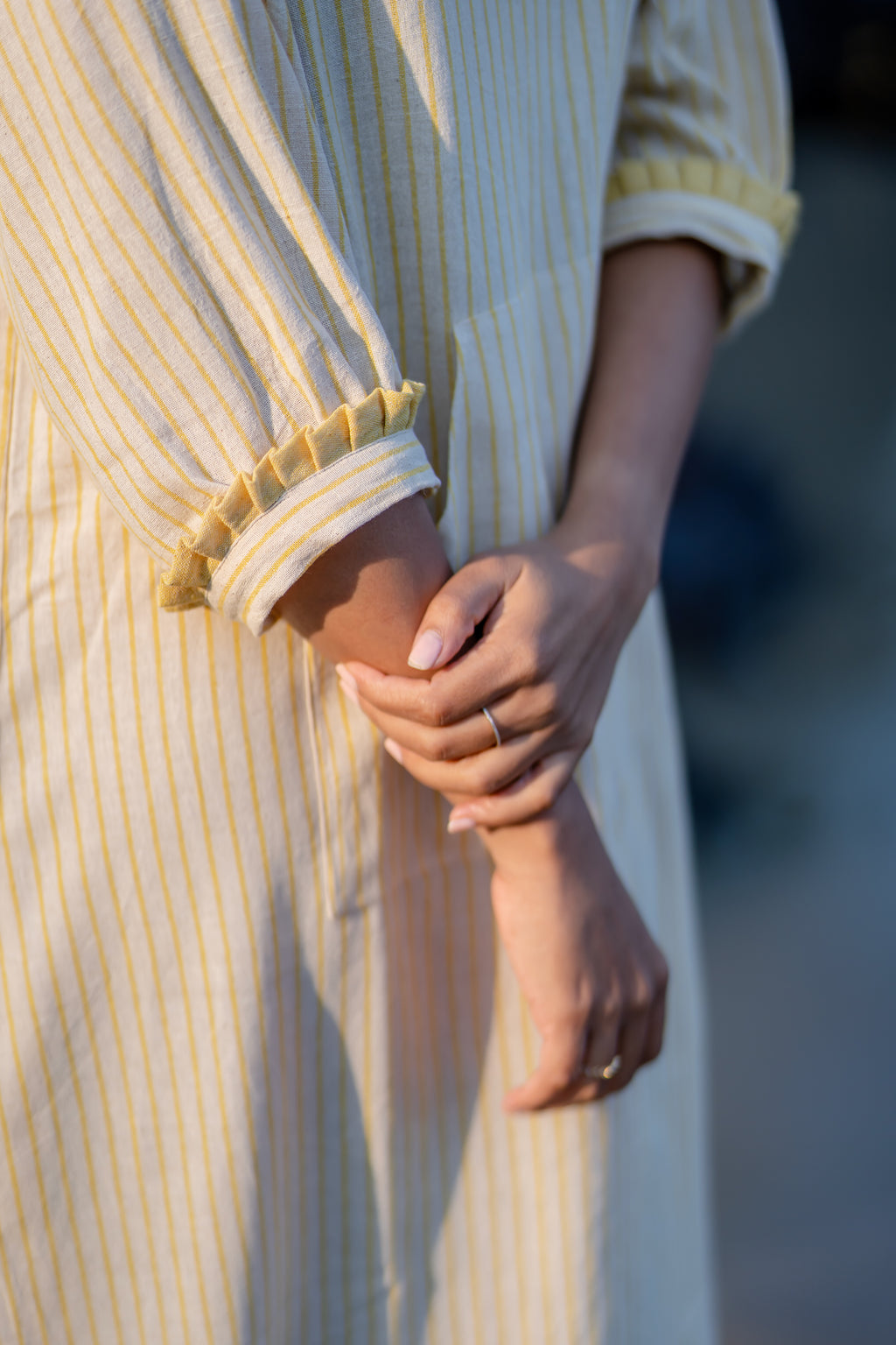 Yellow Striped Frilled Sleeve Dress at Kamakhyaa by Krushnachuda. This item is Handloom Cotton, Midi Dresses, Natural Dye, Organic, Relaxed Fit, Resort Wear, Stripes, Yellow