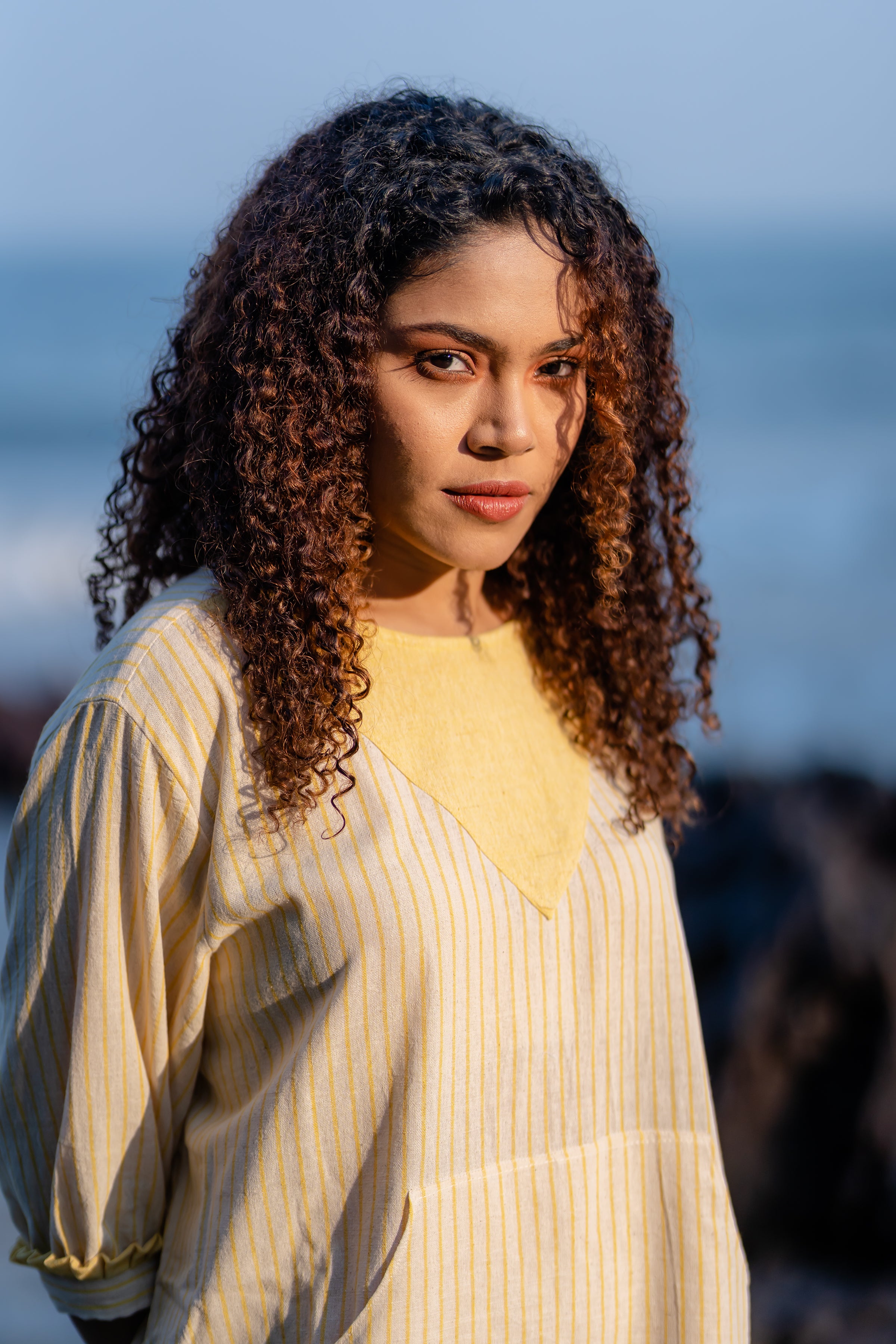 Yellow Striped Frilled Sleeve Dress at Kamakhyaa by Krushnachuda. This item is Handloom Cotton, Midi Dresses, Natural Dye, Organic, Relaxed Fit, Resort Wear, Stripes, Yellow