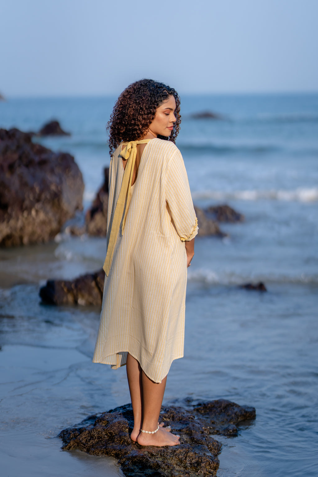 Yellow Striped Frilled Sleeve Dress at Kamakhyaa by Krushnachuda. This item is Handloom Cotton, Midi Dresses, Natural Dye, Organic, Relaxed Fit, Resort Wear, Stripes, Yellow