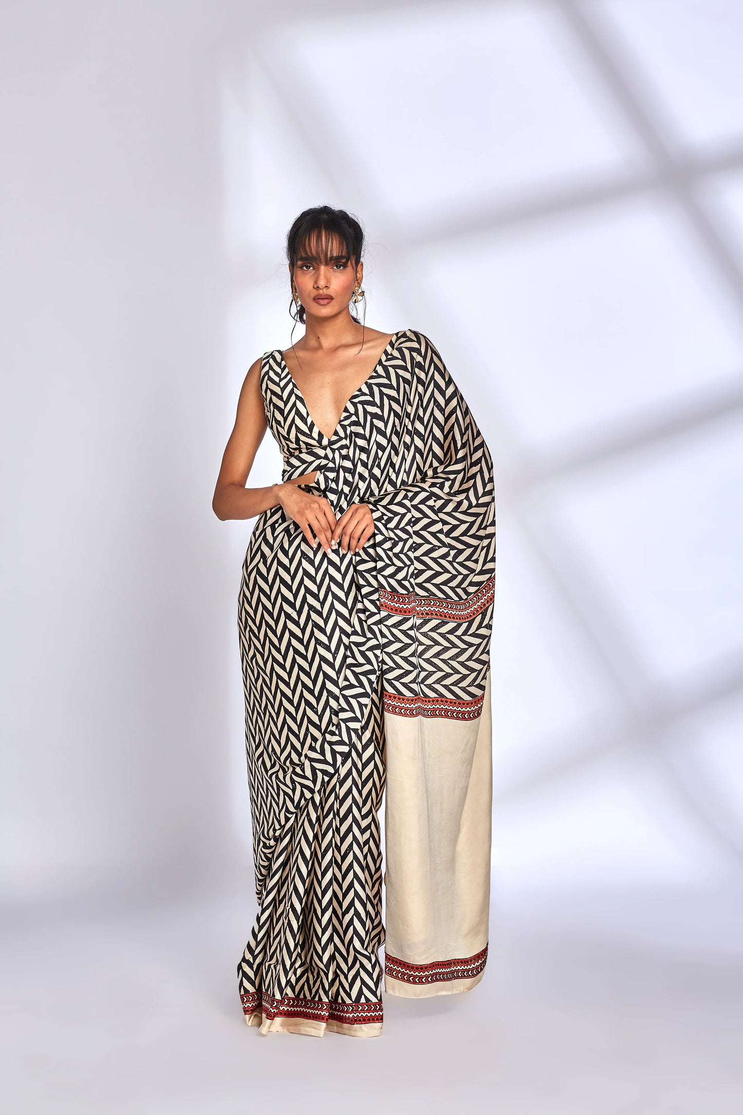 Zig Zag Print Saree at Kamakhyaa by Hasttvam. This item is Festive Wear, Handmade by Artisans, Modal silk, Natural dyes, Relaxed Fit, Respondible production and Vegan, Stripes, White