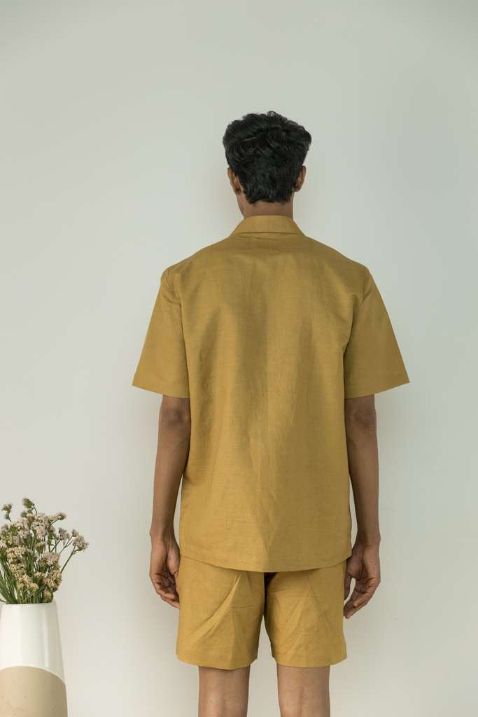 Almond Yellow Shacket at Kamakhyaa by Anushé Pirani. This item is Best Selling, Casual Wear, Cotton, Cotton Hemp, For Him, For Siblings, Handwoven, Hemp, Jackets, Mens Overlay, Menswear, Overlays, Relaxed Fit, Shibumi Collection, Solids, Yellow