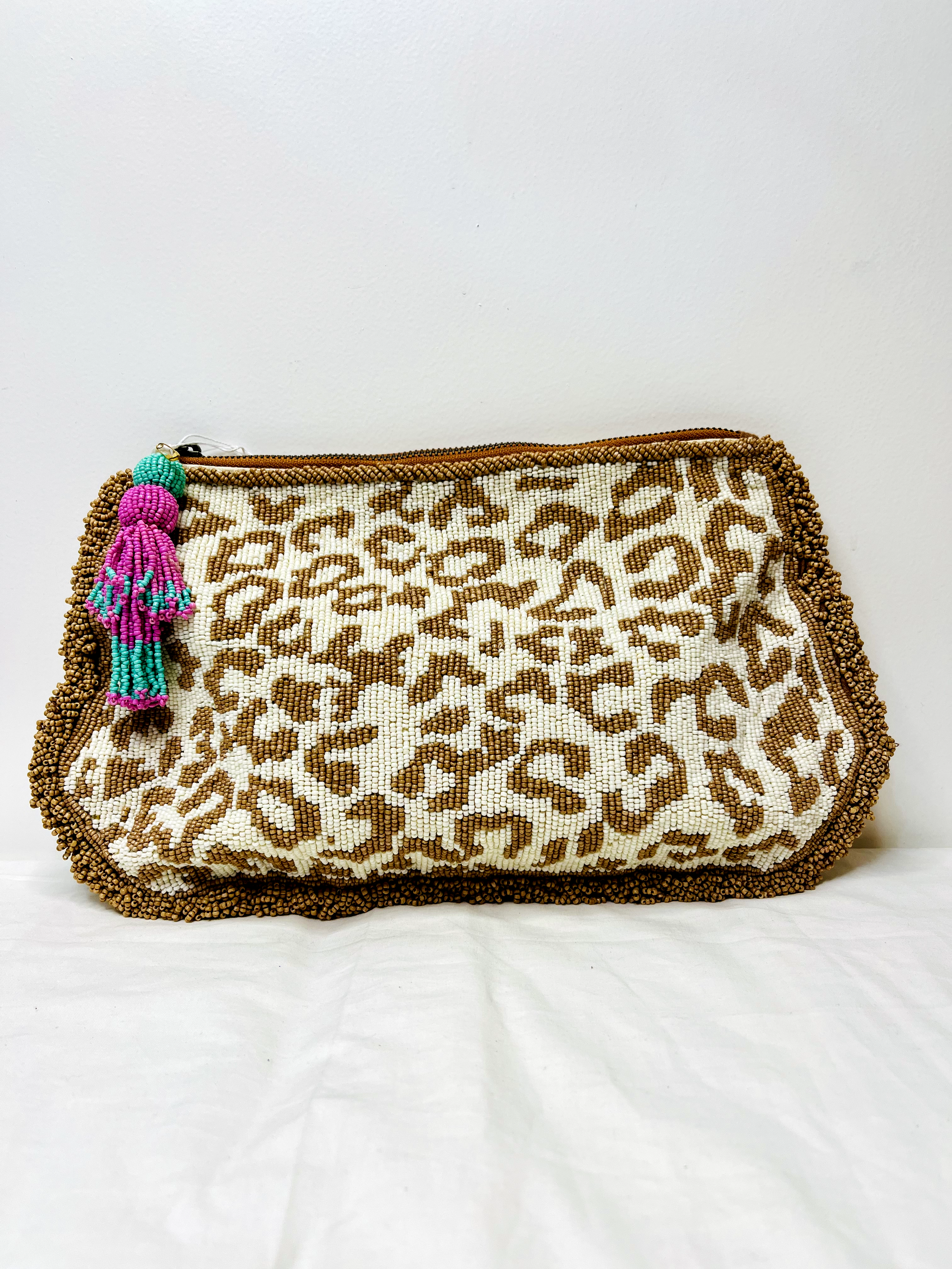 Animal Print Pouch at Kamakhyaa by Pre Loved. This item is Bags, Casual Wear, Mirror Work, Multicolor, Natural, Pouches