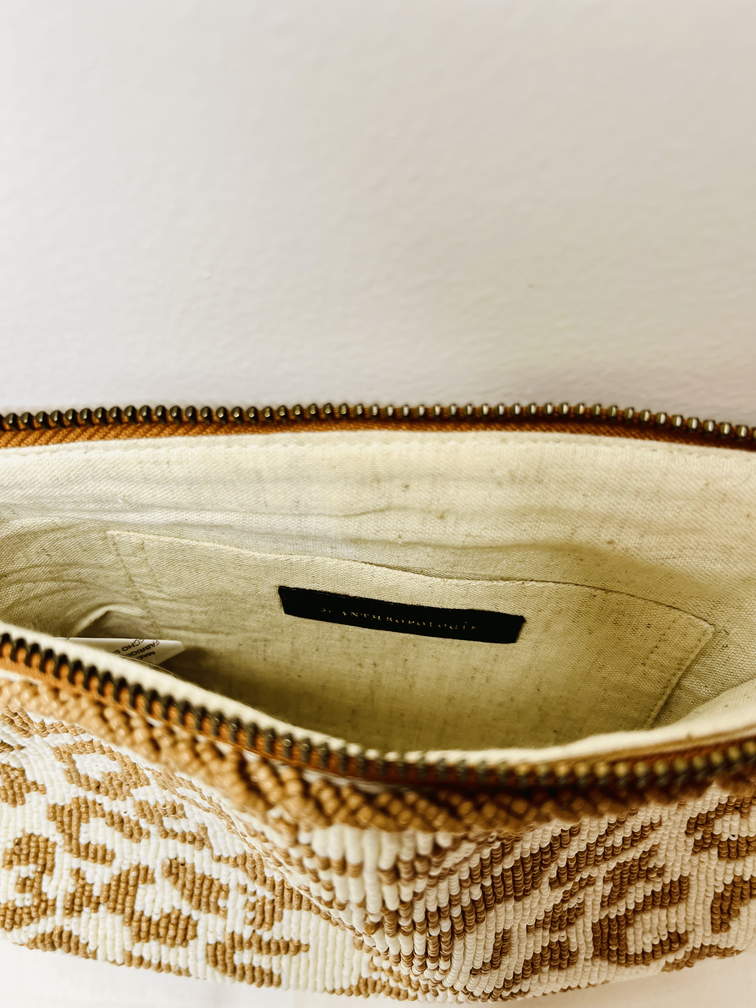 Animal Print Pouch at Kamakhyaa by Pre Loved. This item is Bags, Casual Wear, Mirror Work, Multicolor, Natural, Pouches