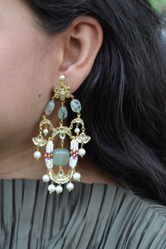 Ardh Chandrika Earrings at Kamakhyaa by House Of Heer. This item is Alloy Metal, Brass, Earrings, Festive Jewellery, Festive Wear, Free Size, Gemstone, Gold, Handcrafted Jewellery, jewelry, July Sale, July Sale 2023, Long Earrings, Natural, Pearl, Polkis, Red, Textured, Vaaruni Gold, White
