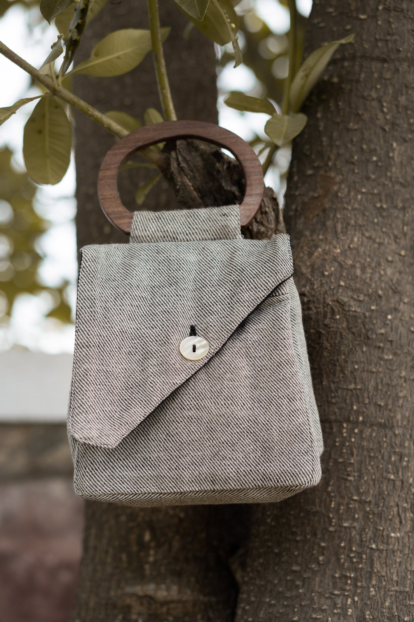 Assymetric Flap Bag at Kamakhyaa by Lafaani. This item is 100% pure cotton, Bags, Black, Casual Wear, Grey, Handbags, Natural with azo free dyes, Organic, Regular Fit, Solids, Sonder