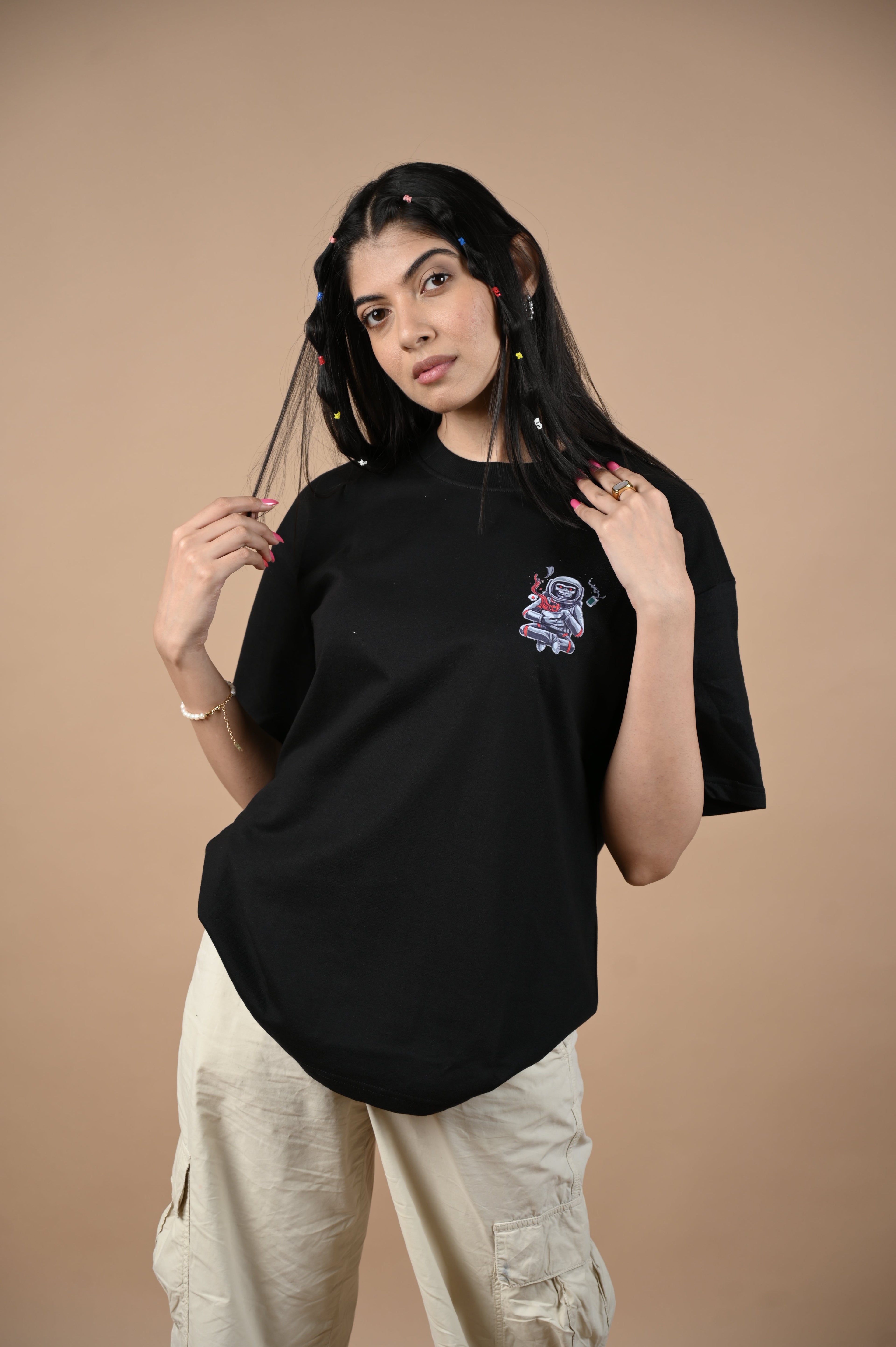 Astronaut 100% Cotton Oversized Black T-shirt at Kamakhyaa by Unfussy. This item is 100% cotton, Black, Casual Wear, Organic, Oversized Fit, Printed, T-Shirts, Unfussy, Unisex, Womenswear