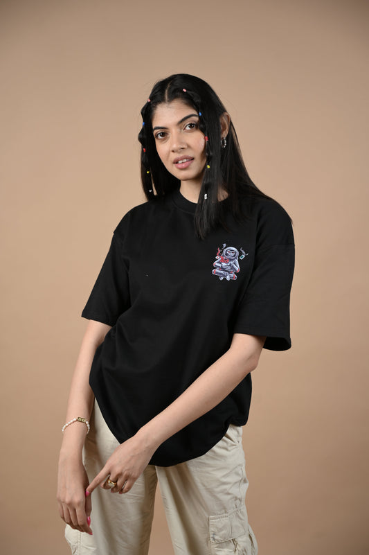 Astronaut 100% Cotton Oversized Black T-shirt at Kamakhyaa by Unfussy. This item is 100% cotton, Black, Casual Wear, Organic, Oversized Fit, Printed, T-Shirts, Unfussy, Unisex, Womenswear